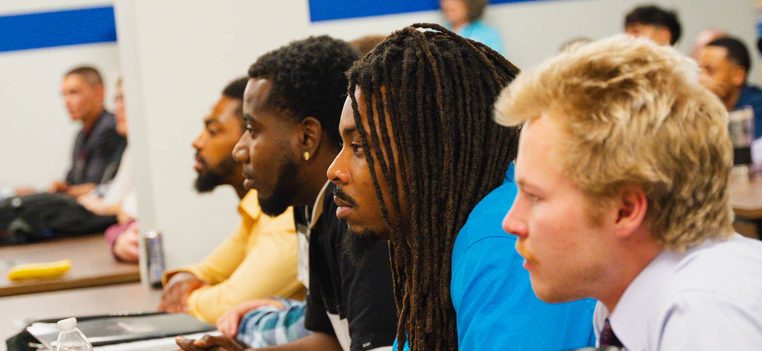 Students in a classroom, they are listening to a lecture